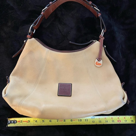 Dooney and Bourke bag. Soft tan/golden color with red interior - Picture 2 of 10